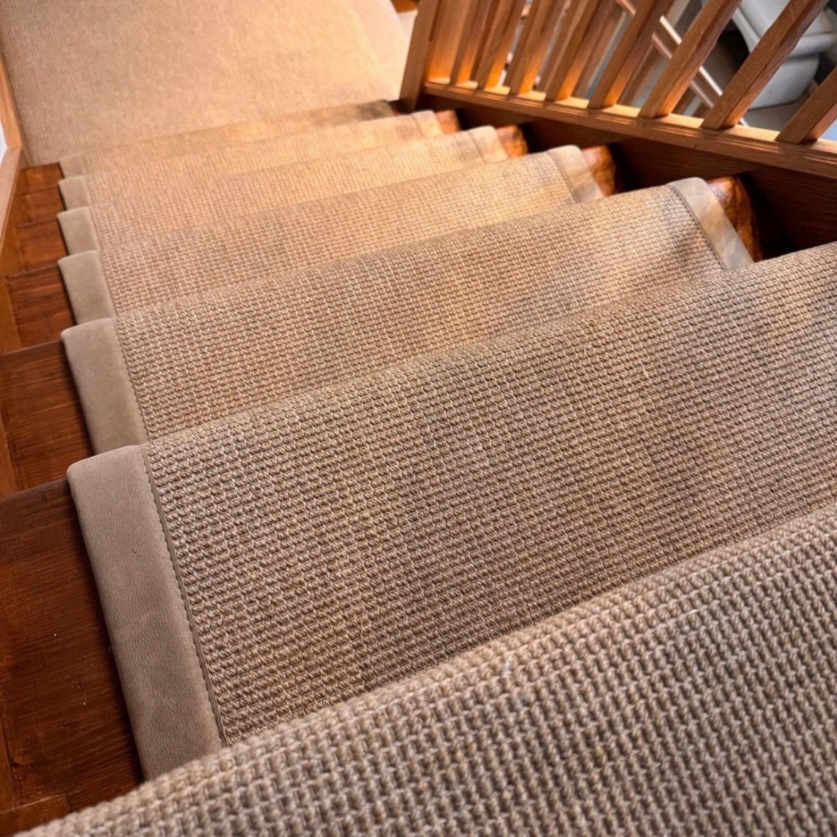 Textured wool stair runner with suede binding